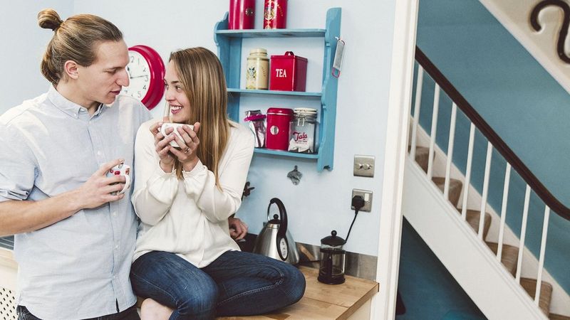 Male and female couple in a kitchen
